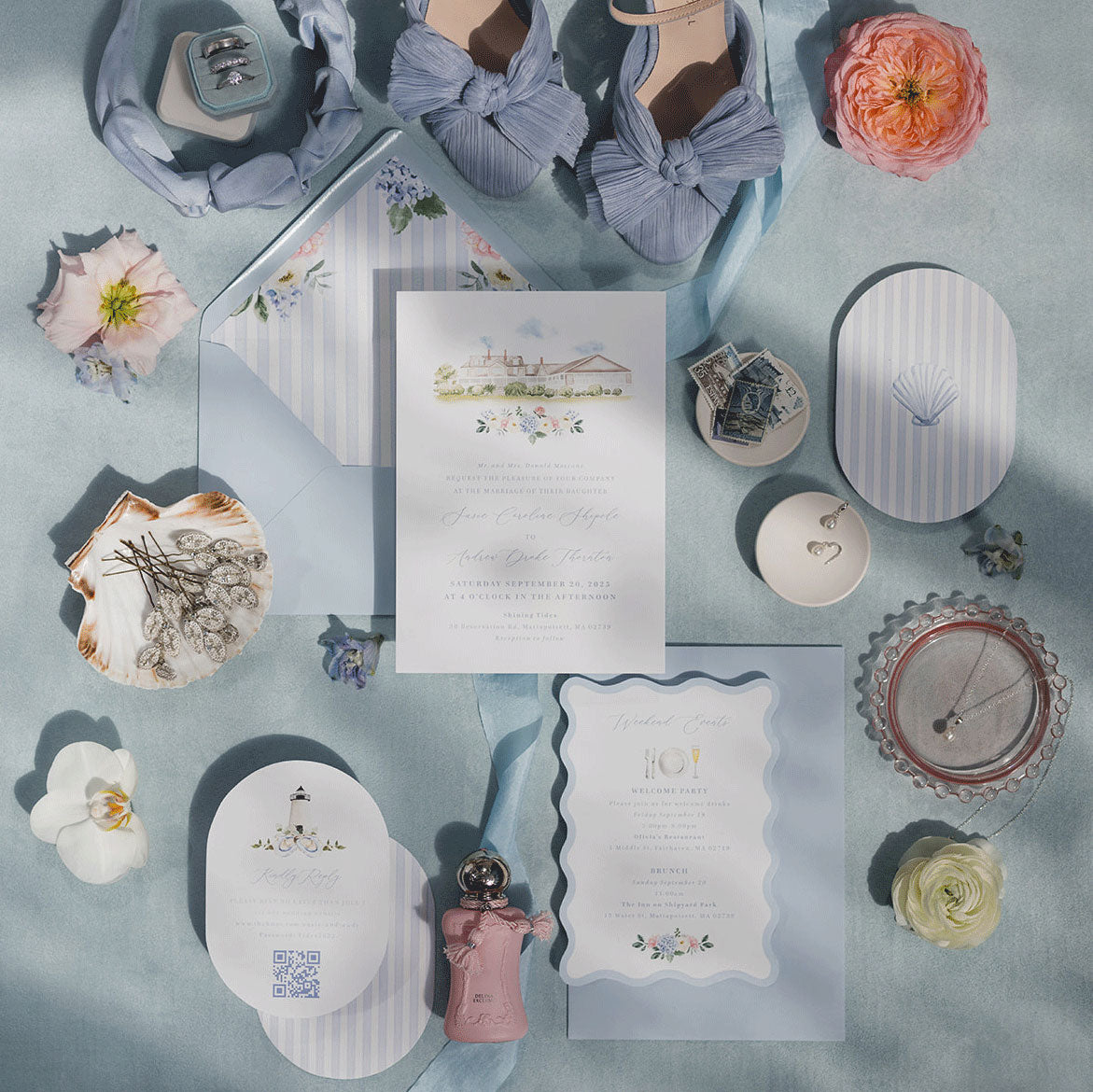 Powder blue wedding invitation set with custom venue illustration and shaped order of events, RSVP card, blue pinstripes and envelope liners